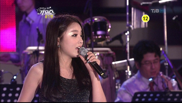 洪真英 - Love Battery 111014 TJB 111022 SBS Top10 全國歌謠秀.ts.jpg